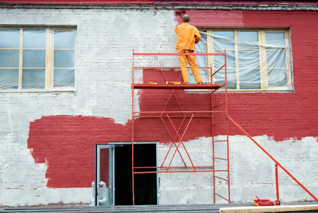 Exterior House Painting Costs in New England 1 painting red