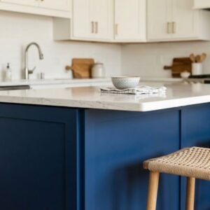 Is Cabinet Refinishing Worth It in Bedford, NH? 3 Close-up of a kitchen island painted in a bold navy blue